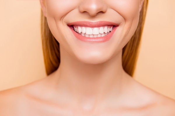 How A Cosmetic Dentist Can Boost Your Smile